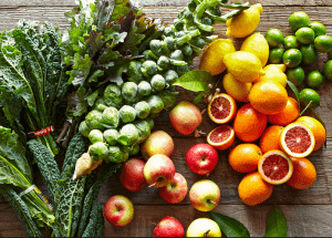 a group of fruits and vegetables on a wood surface Healthy Weight Loss Diets Lyndhurst